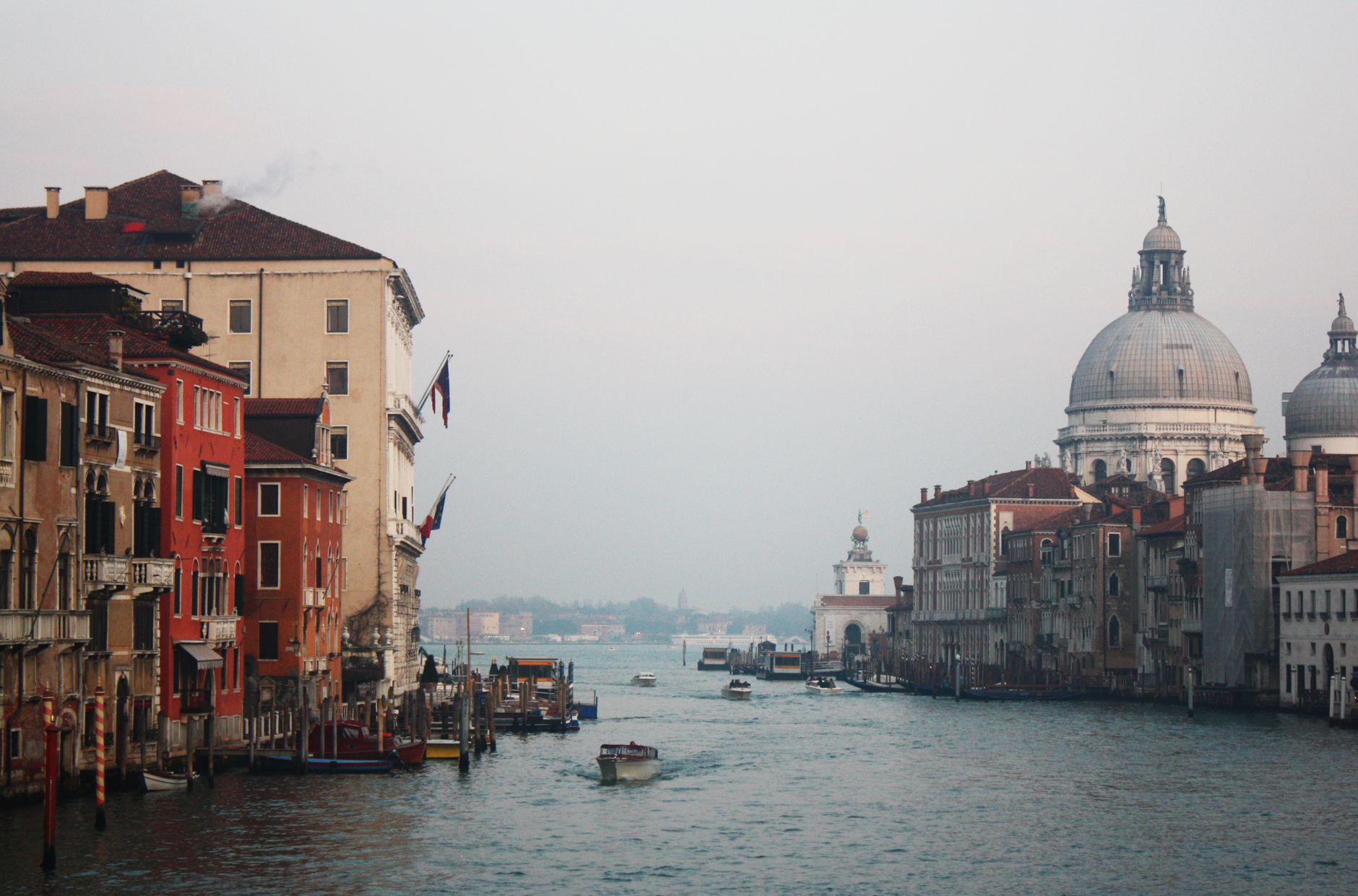 Venice's Grand Canal showcasing historic architecture and watercraft