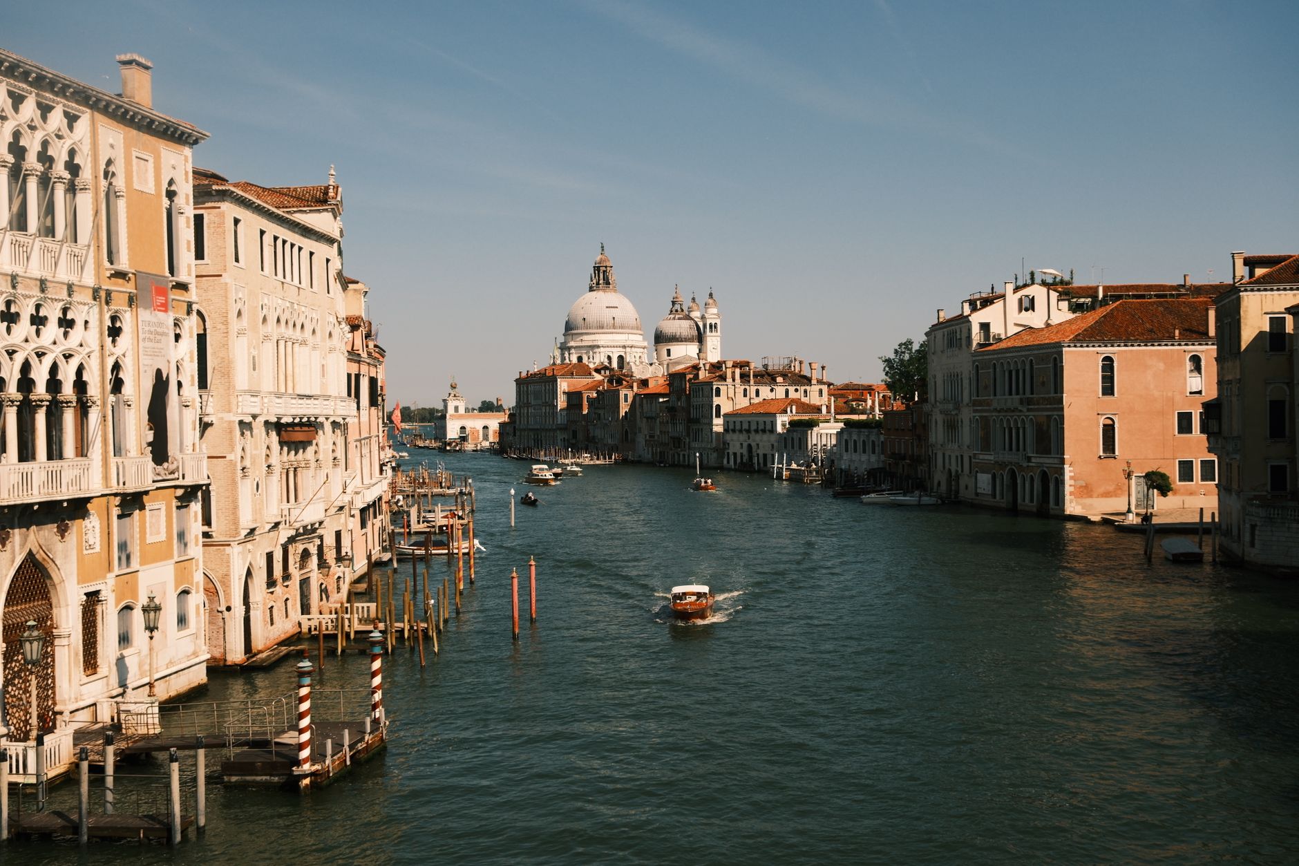 Venice's Grand Canal, featuring historic architecture and waterway activity