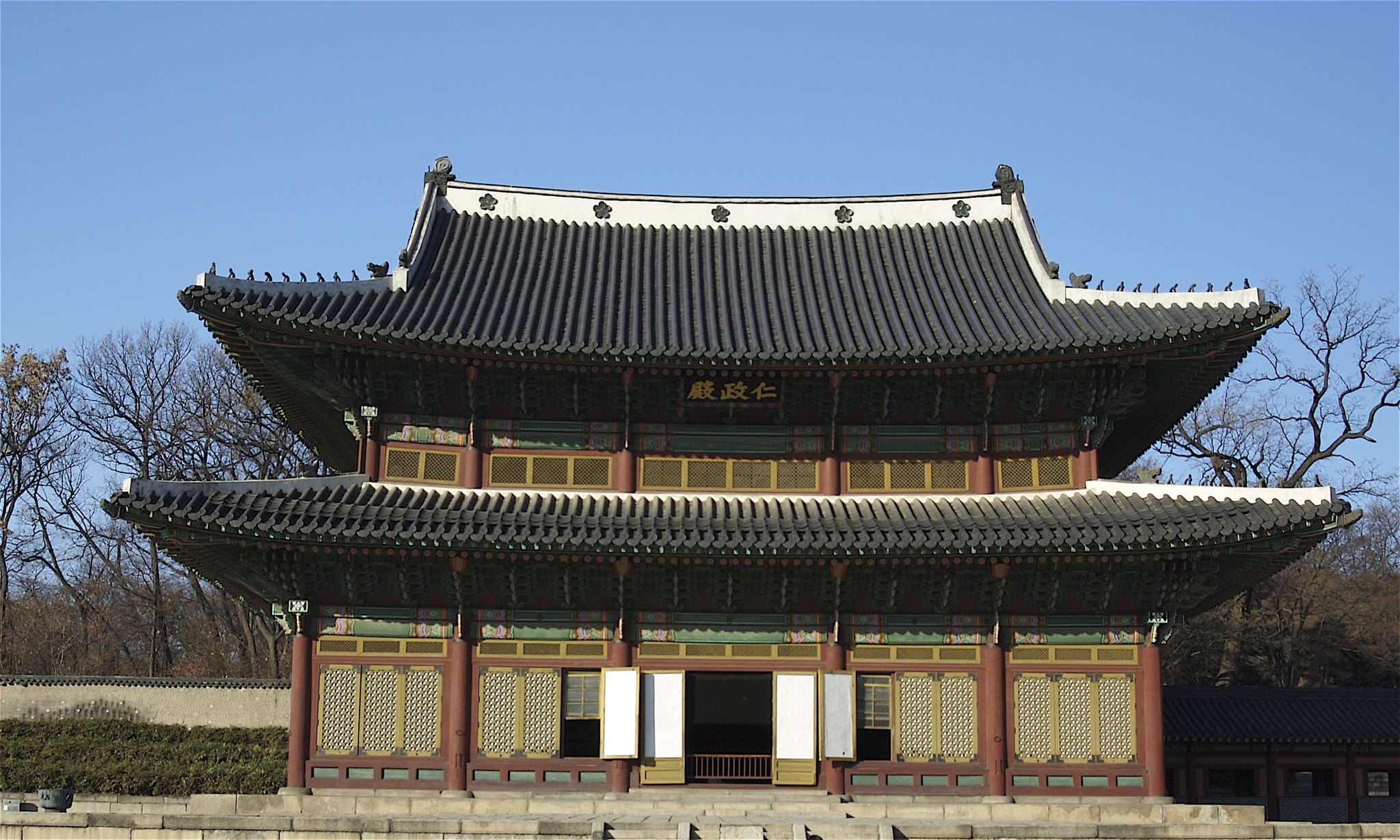 Injeongjeon, the main hall of Changdeokgung, under a bare-branched winter sky
