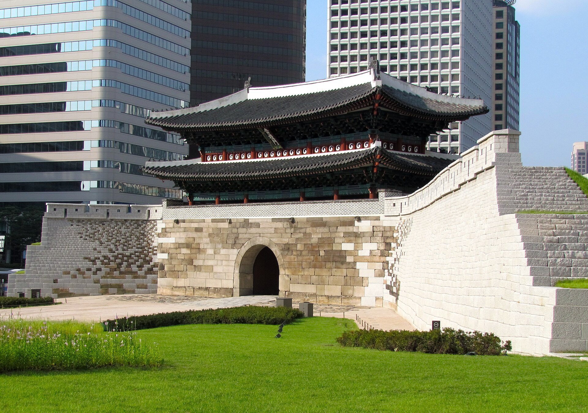 Sungnyemun on its stone base with a lawn in front of it