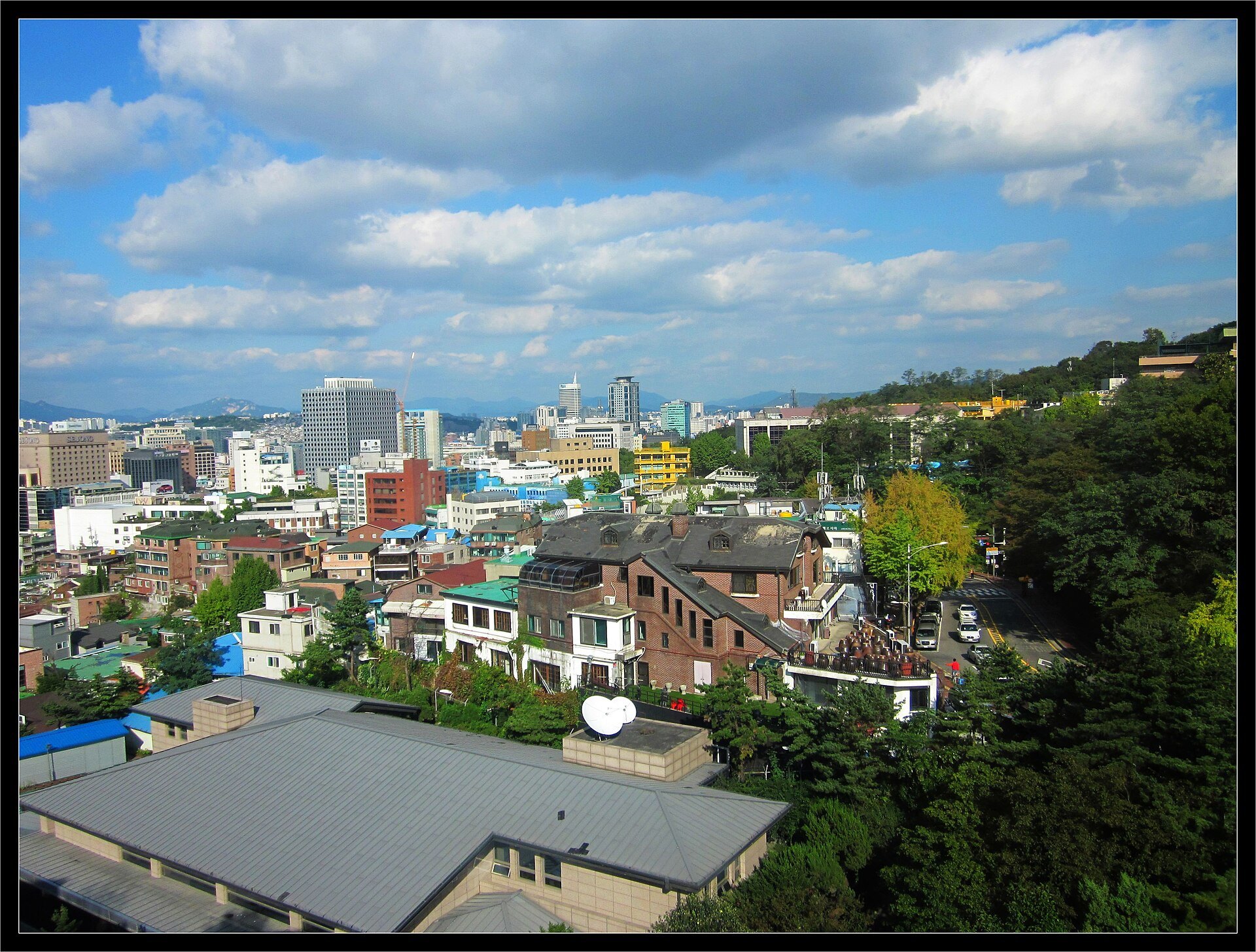 Central Seoul spread out to the hills, seen in daylight from Namsan