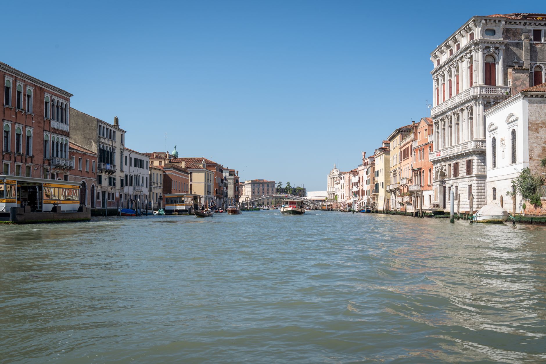Venice's Grand Canal with historic architecture bathed in sunlight